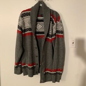 Gray cozy cardigan with red,black and white pattern